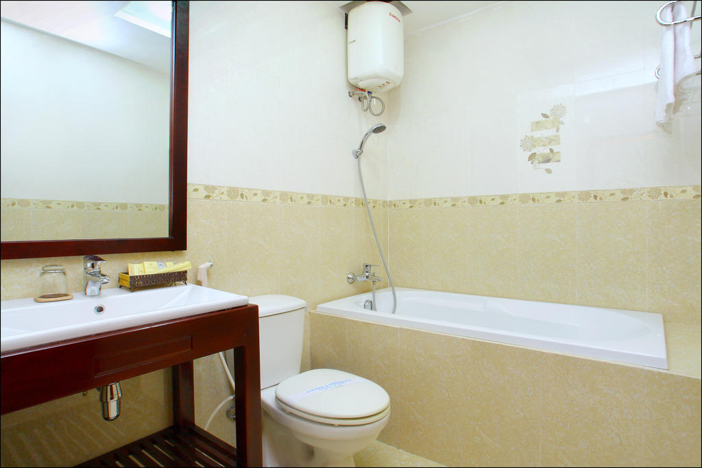 Nhi Trung Hotel Хой Ан Стая снимка